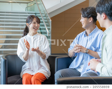 Group work seminar Young men and women having a conversation 105558939