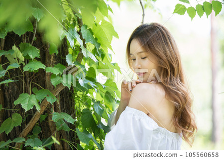 a beautiful woman in the forest a beautiful woman in the forest 105560658