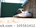 baseball spikes on the ground 105561412