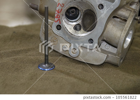 The intake valve and motorcycle cylinder head parts. The intake valve and motorcycle cylinder head parts. 105561822