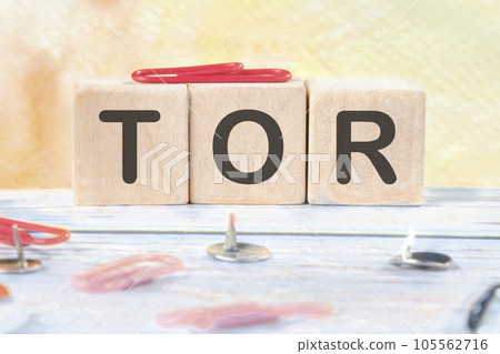 the word TOR signs on wooden cubes on a light background the word TOR signs on wooden cubes on a light background 105562716