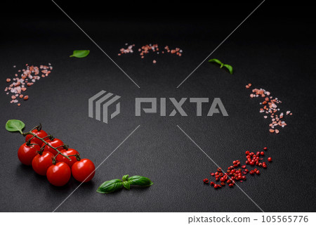 Ingredients for cooking cherry tomatoes, salt, spices and herbs 105565776