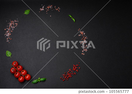 Ingredients for cooking cherry tomatoes, salt, spices and herbs 105565777