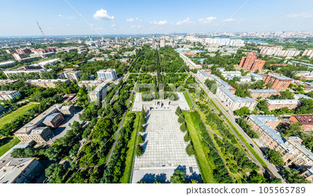 Aerial city view with roads, houses and buildings. 105565789