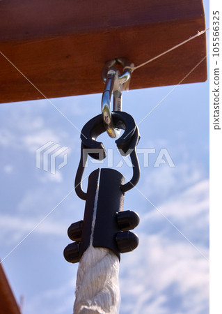 Rope clasp metal hook for climbing exercises. Rope clasp metal hook for climbing exercises. 105566325