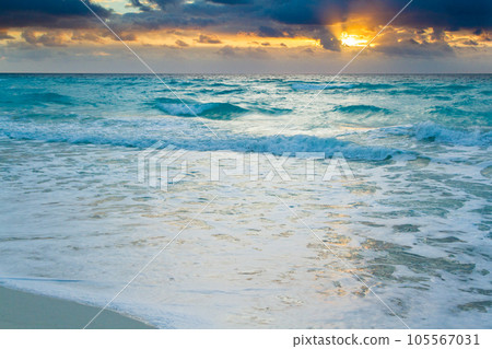 Sunrise over the beach on Caribbean Sea. 105567031