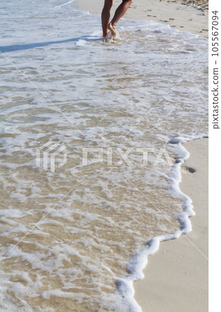 Fresh footprints on the beach. Fresh footprints on the beach. 105567094