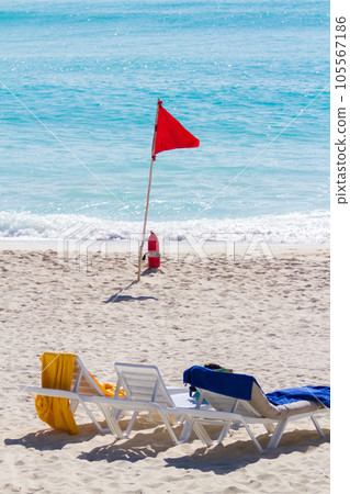 White pool chairs on the beach. White pool chairs on the beach. 105567186