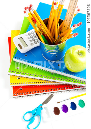 Variety of school supplies on a white background. Variety of school supplies on a white background. 105567298
