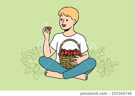 Little boy eats strawberries sitting in clearing with yagid bushes on fruit farm or plantation 105568746