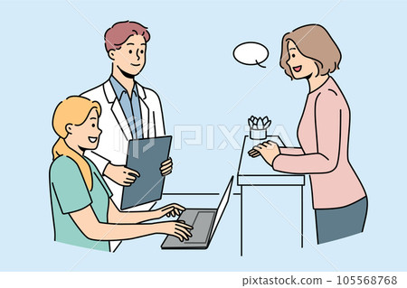 Woman client of clinic or hospital stands near reception desk and consults with doctor.  105568768
