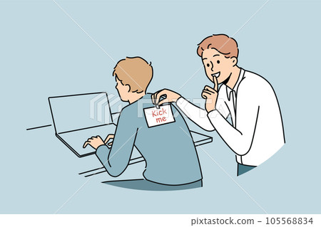 Man sticks kick me sticker on back of colleague working with laptop to make prank and laugh 105568834