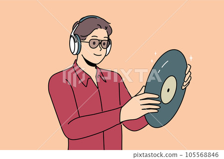 Hipster man with vinyl record listens to music in headphones, collecting retro discs Hipster man with vinyl record listens to music in headphones, collecting retro discs 105568846
