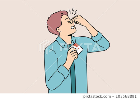 Man pinches bleeding nose and holds bloody handkerchief due to high blood pressure 105568891