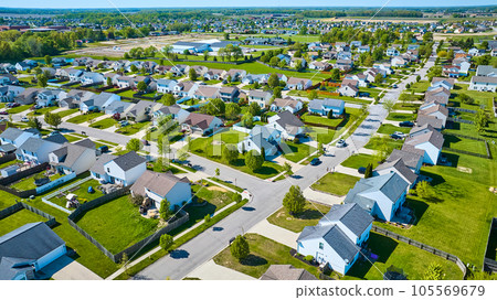 Row after row of houses in suburban neighborhood in summer Row after row of houses in suburban neighborhood in summer 105569679