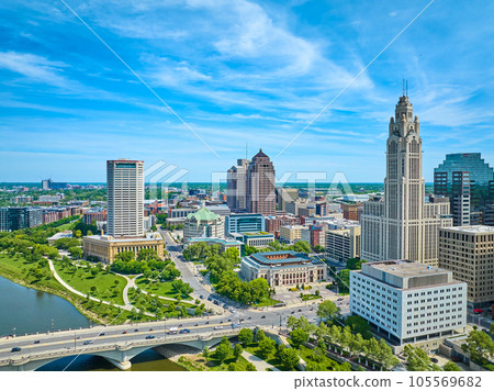 Downtown Columbus Ohio aerial with bridge and river leading to skyscrapers Downtown Columbus Ohio aerial with bridge and river leading to skyscrapers 105569682