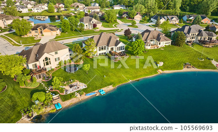 Aerial lakeside homes or pondside houses expensive property aerial Aerial lakeside homes or pondside houses expensive property aerial 105569693