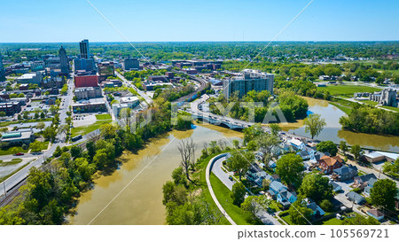 Three Rivers intersecting in Fort Wayne Indiana with houses, bridge, train tracks, skyscrapers Three Rivers intersecting in Fort Wayne Indiana with houses, bridge, train tracks, skyscrapers 105569721