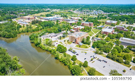 Aerial PFW college campus St Joseph River view of buildings with distant dorm rooms in summer 105569790