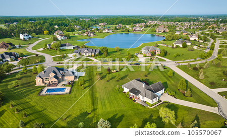 Large pond side properties rich expensive neighborhood fresh cut lawns and pool in backyard Large pond side properties rich expensive neighborhood fresh cut lawns and pool in backyard 105570067