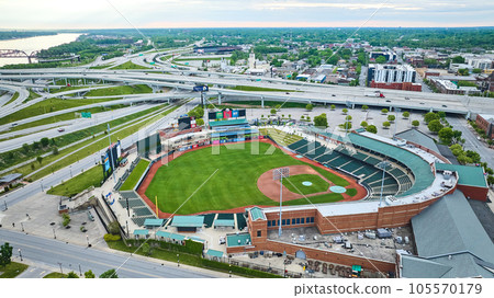 Aerial Louisville Slugger Field empty baseball diamond with criss crossing highway roads Aerial Louisville Slugger Field empty baseball diamond with criss crossing highway roads 105570179