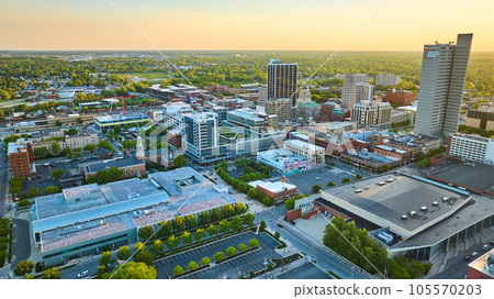 Orange glow summer sunrise over Downtown Fort Wayne business architecture cityscape skyline 105570203
