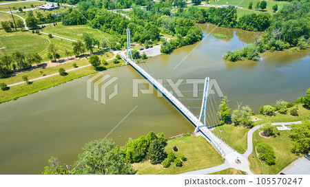 Aerial Ron Venderly Family Bridge pedestrian walking bridge over St. Joseph River to soccer fields 105570247