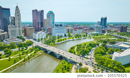 Bridge from Center of Science and Industry to skyscrapers in downtown Columbus Ohio aerial 105570325