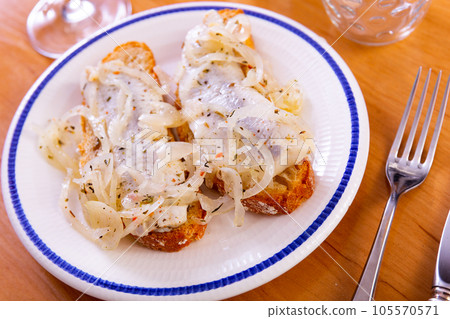 Appetizing sandwiches with lightly salted herring 105570571