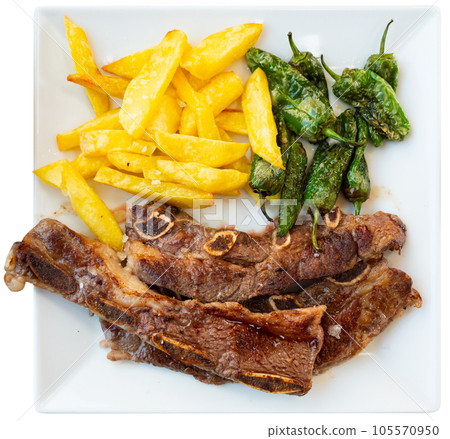 Delicious grilled Churasco beef steak with stewed peppers close up 105570950
