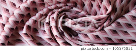 Swirled pink and white fabric with geometric ornament as background. Swirled pink and white fabric with geometric ornament as background. 105575831