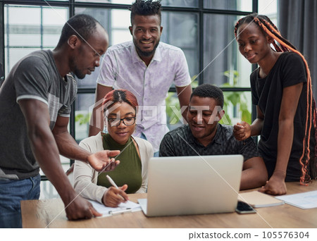 Group of students are discussing the university project 105576304