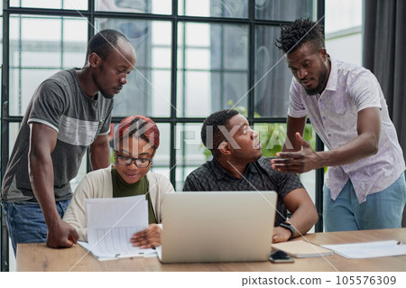 Group of students are discussing the university project 105576309