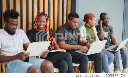 Group of diverse people are waiting for a job interview 105576474