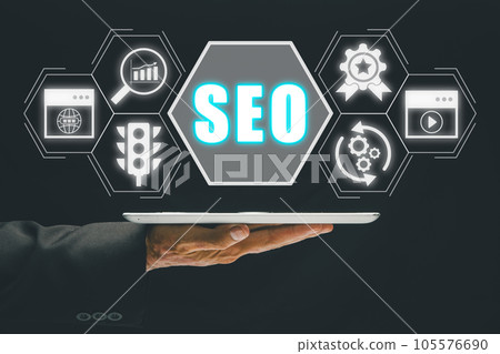 SEO Concept, Search Engine Optimization, Man hand using digital tablet with VR screen seo icon, concept for promoting ranking traffic on website, optimizing your website to rank in search engines. 105576690