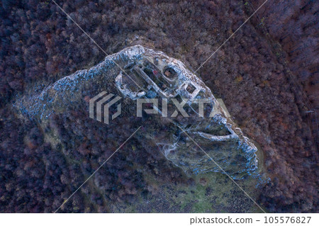 Drone aerial of abandoned fortress on a hill Drone aerial of abandoned fortress on a hill 105576827