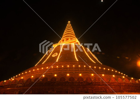 Night time of Phra Pathom Chedi or Phra Thom Chedi, which is one of the largest and tallest chedi in Thailand. And is an important religious place. Located at Nakhon Pathom Province in Thailand. Night time of Phra Pathom Chedi or Phra Thom Chedi, which is one of the largest and tallest chedi in Thailand. And is an important religious place. Located at Nakhon Pathom Province in Thailand. 105577502