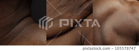 Close-up image of muscular, strong, dark colored male body. Masculinity. Male beauty. Body like art Close-up image of muscular, strong, dark colored male body. Masculinity. Male beauty. Body like art 105578747