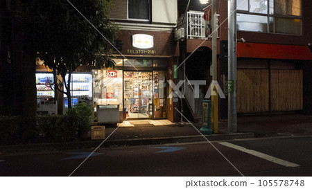 Liquor store lights at night 105578748