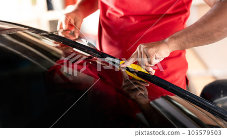 Car side window film removal and tinting installation 105579503