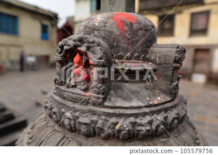 Bas relief statuette of sitting Buddha in Swayambhunath. Now destroyed after the earthquake that hit Kathmandu, Nepal 105579756