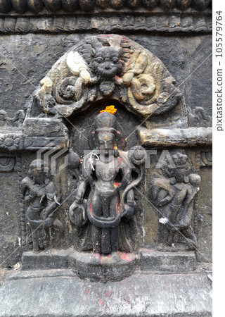 Ancient statuette of sitting Buddha in Swayambhunath. Now destroyed after the earthquake that hit Kathmandu, Nepal 105579764