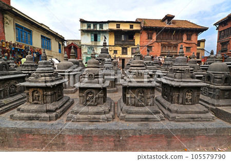 Ancient statues in Swayambhunath, Nepal. Now destroyed after the earthquake that hit Kathmandu, Nepal Ancient statues in Swayambhunath, Nepal. Now destroyed after the earthquake that hit Kathmandu, Nepal 105579790