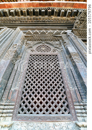 Carved wooden entrance to a public Hindu temple. Kathmandu, Nepal Carved wooden entrance to a public Hindu temple. Kathmandu, Nepal 105579796