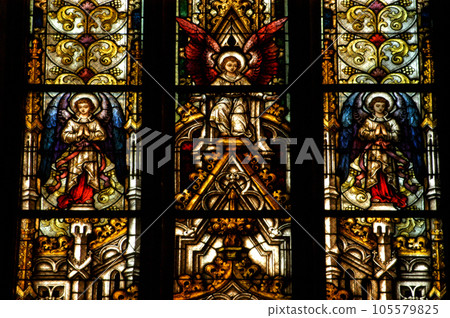 Stained glass window detail with Biblical scene 105579825