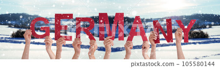 People Hands Building Word Germany, Winter Background People Hands Building Word Germany, Winter Background 105580144
