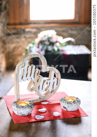 Wedding wood sign LOVE Heart, Text in German YOU and Me for Background photo with candles Wedding wood sign LOVE Heart, Text in German YOU and Me for Background photo with candles 105580375