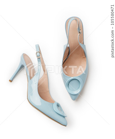 Elegant patent leather stiletto sandals. A new pair of shoes on a white background. 105580471