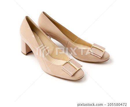 Elegant patent leather heeled sandals. A new pair of shoes on a white background. 105580472