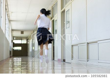 High school girl running on dash High school girl running on dash 105582081